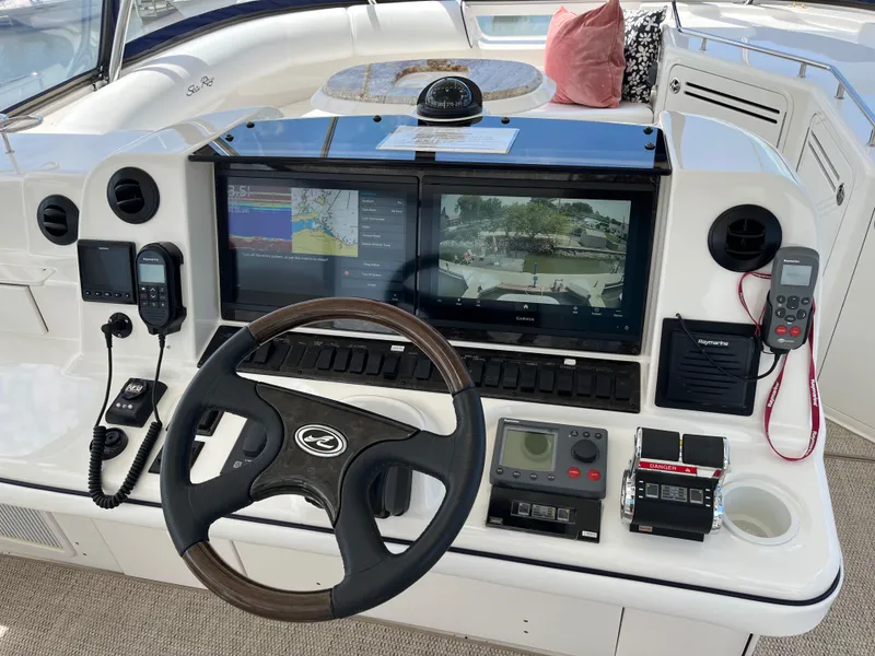 Slide: The Image of Control panel of a 2008 Sea Ray 58 Sedan yacht with navigation equipment. - 21