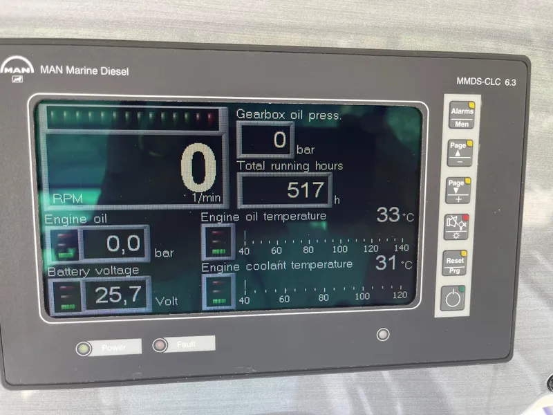 Slide: The Image of 2008 Sea Ray 58 Sedan engine display showing 517 running hours and various temperature readings. - 26