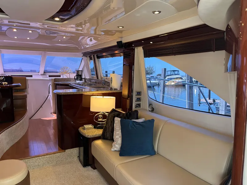 Slide: The Image of Luxurious interior of 2008 Sea Ray 58 Sedan yacht with elegant seating and modern amenities. - 31