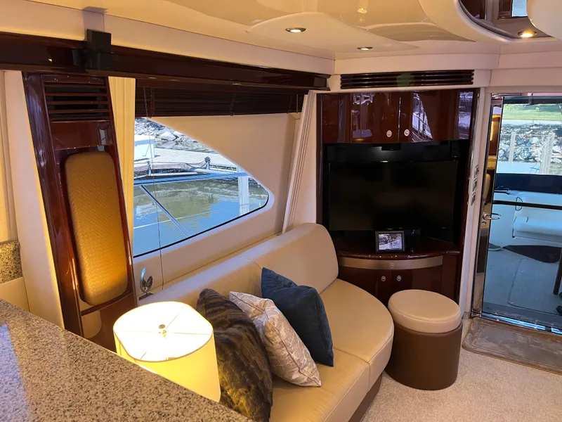 Slide: The Image of Luxurious interior of 2008 Sea Ray 58 Sedan yacht with cozy seating and modern decor. - 39