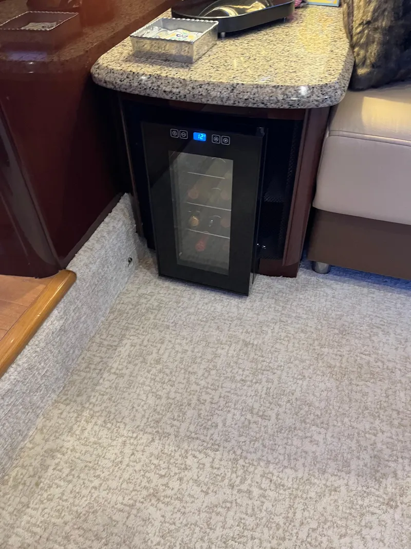 Slide: The Image of Mini wine fridge in 2008 Sea Ray 58 Sedan yacht interior. - 40
