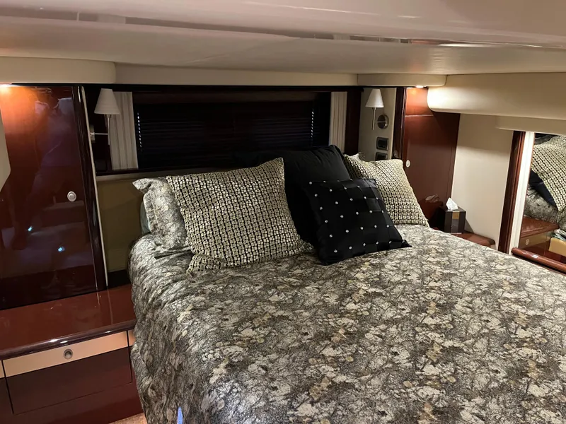 Slide: The Image of Luxurious bedroom interior of 2008 Sea Ray 58 Sedan yacht with elegant bedding. - 44