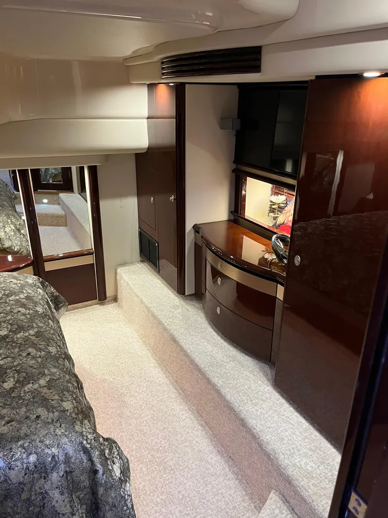 Slide: The Image of Luxurious interior of 2008 Sea Ray 58 Sedan yacht with elegant wood finishes. - 46