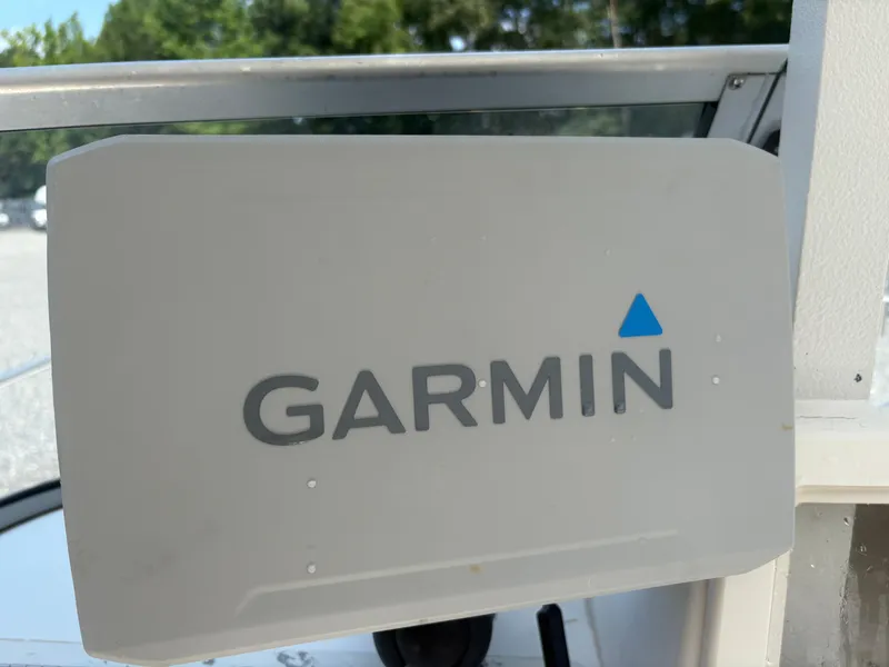 Slide: The Image of Garmin device on 2000 Key West 2300 Bluewater boat dashboard. - 16