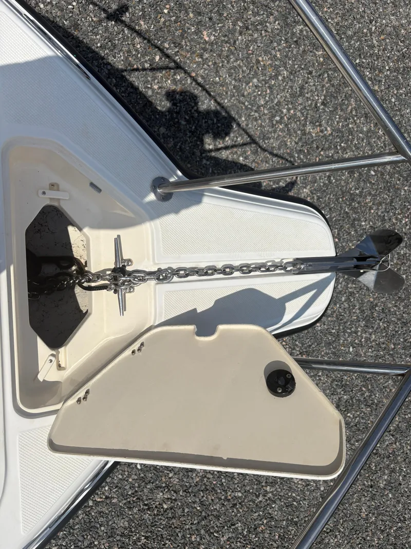 Slide: The Image of Anchor and chain on a 2000 Key West 2300 Bluewater boat deck. - 25