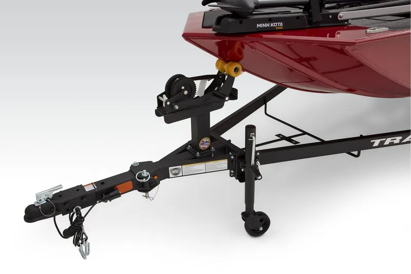 Slide: The Image of 2025 Tracker Panfish 17 boat interior with gray seating and carpeted flooring. - 8