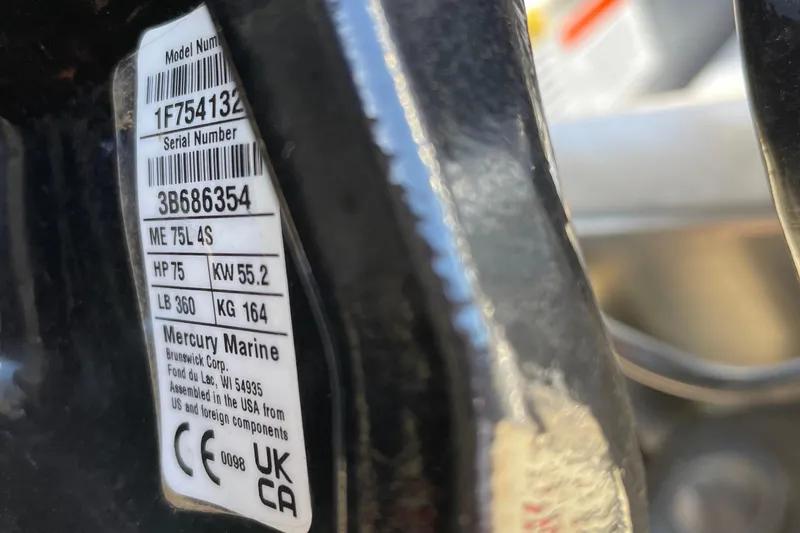 Slide: The Image of Label on Mercury Marine engine, model ME 75L 4S, 75 HP, for Sun Tracker Bass Buggy 18 DLX 2025. - 95