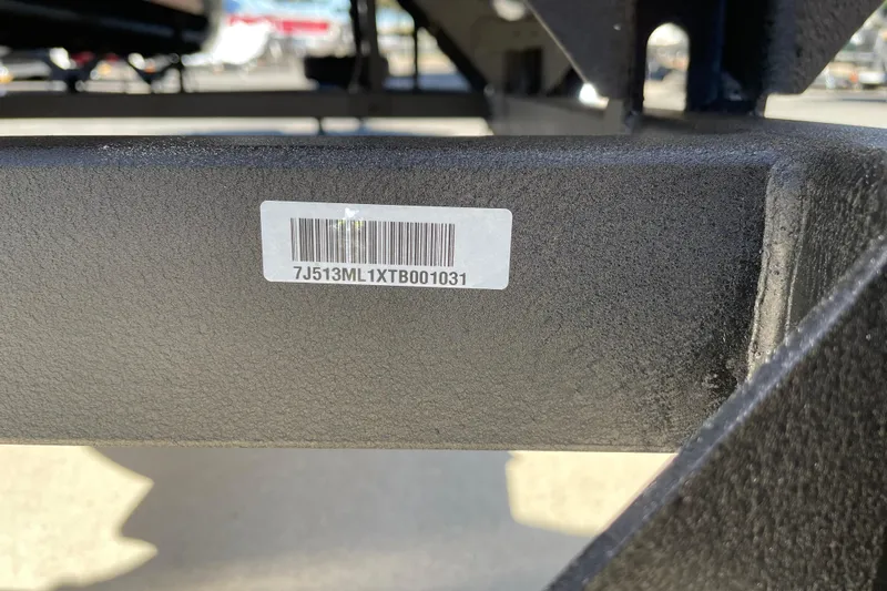 Slide: The Image of Barcode and serial number on 2025 Sun Tracker Bass Buggy 18 DLX boat frame. - 96