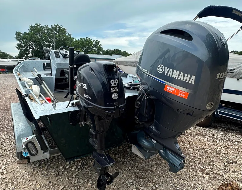 Slide: The Image of 2023 StealthCraft Stealthweld 18 boat with Yamaha and Tohatsu outboard motors. - 10