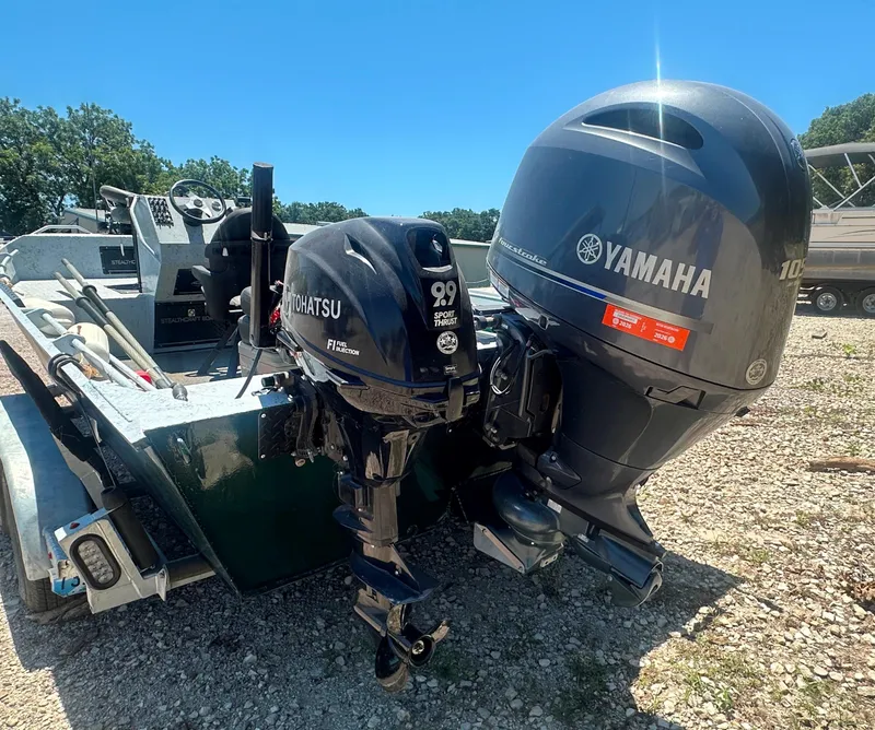 Slide: The Image of 2023 StealthCraft Stealthweld 18 boat with Yamaha and Tohatsu outboard motors. - 14