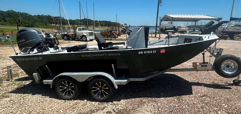 Slide: The Image of 2023 StealthCraft Stealthweld 18 boat on trailer, parked outdoors. - 5