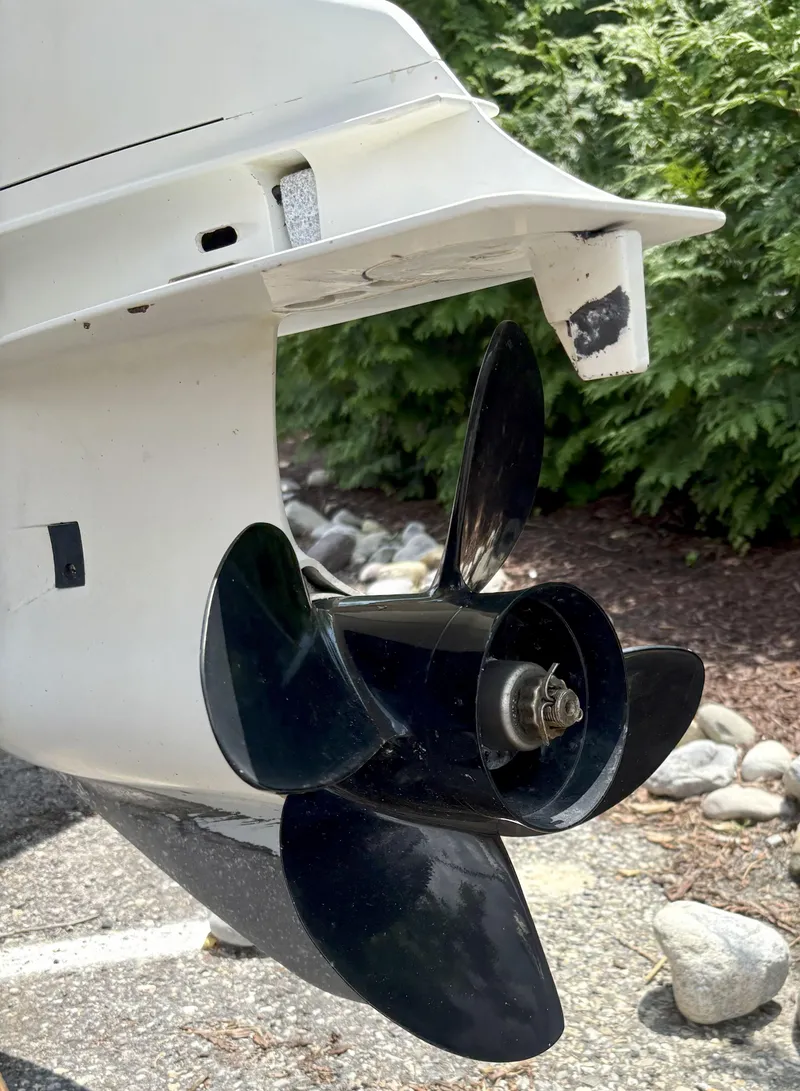 Slide: The Image of Close-up of a boat propeller on a 1999 Century 2300 Center Console. - 14