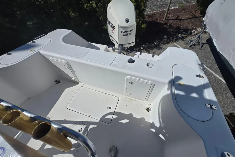 Slide: The Image of 1999 Century 2300 Center Console boat with Evinrude 225 outboard motor. - 17
