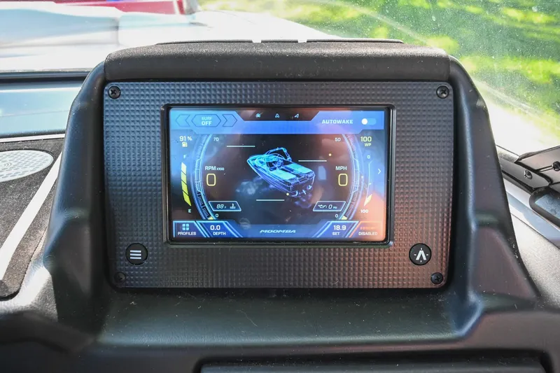 Slide: The Image of Dashboard display of 2021 Moomba Kaiyen boat showing speed and RPM indicators. - 28