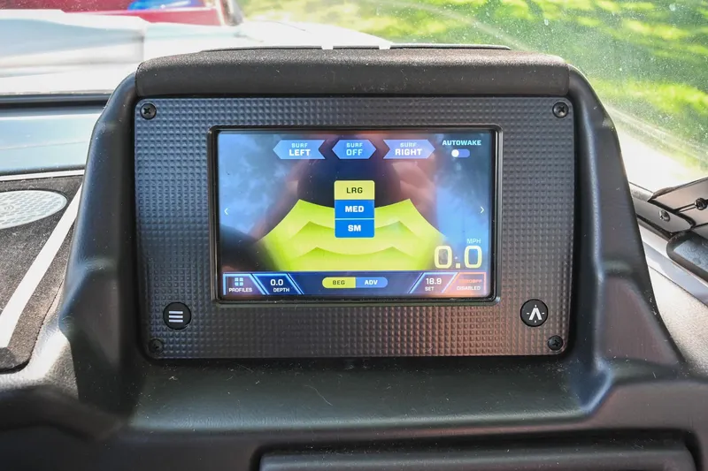 Slide: The Image of 2021 Moomba Kaiyen dashboard display showing surf settings and speed controls. - 29