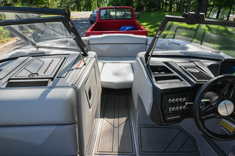 Slide: The Image of Interior of 2021 Moomba Kaiyen boat with modern dashboard and seating. - 31