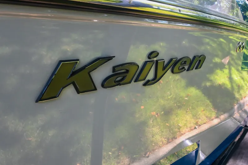 Slide: The Image of 2021 Moomba Kaiyen boat nameplate with reflective surface. - 8