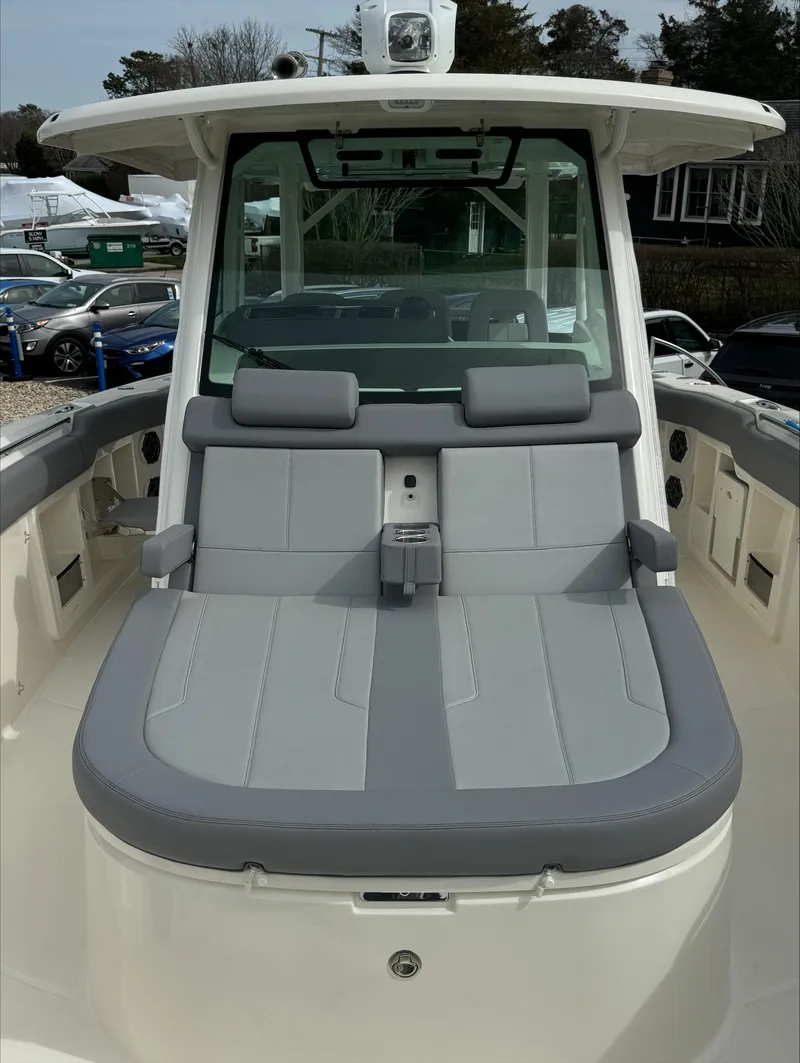 Slide: The Image of 2025 Boston Whaler 380 Outrage boat with spacious seating and modern design. - 37