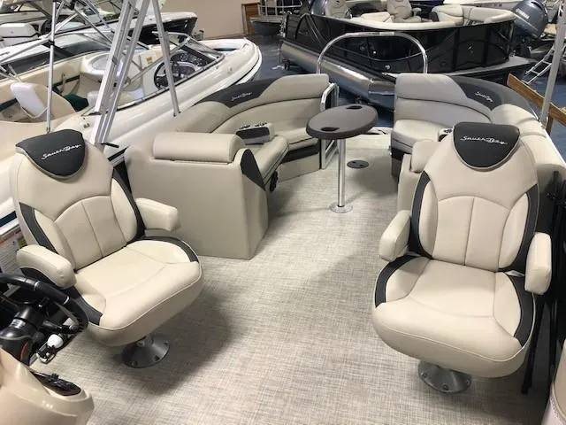 Slide: The Image of 2023 South Bay 224RS LE 2.75 pontoon boat interior with luxurious seating. - 7