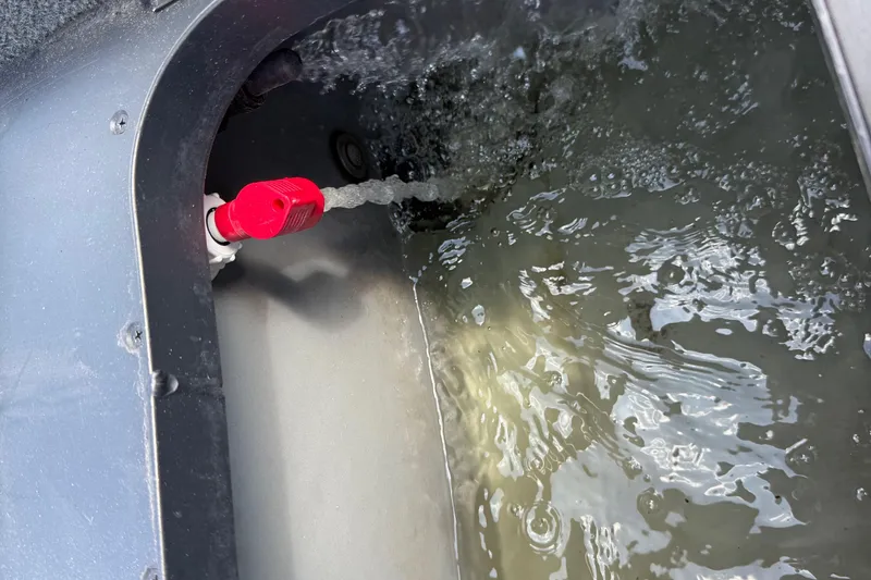 Slide: The Image of Livewell water system in a 2011 Skeeter FX 21 boat. - 24