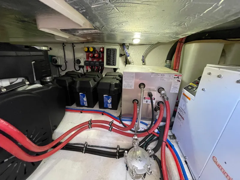 Slide: The Image of Engine room of 2017 Riviera 3600 Sport Yacht with batteries and wiring. - 12