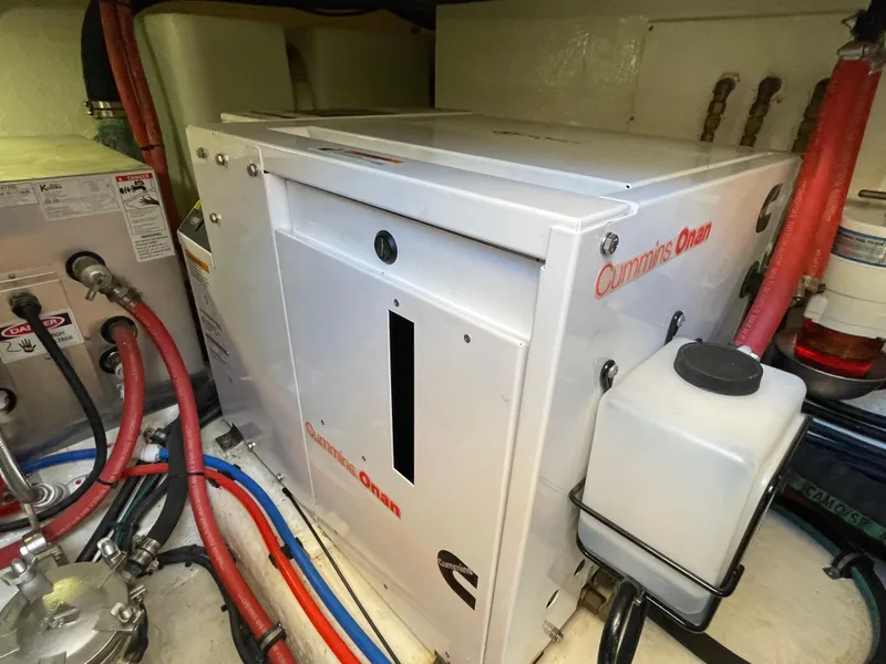 Slide: The Image of Engine room of 2017 Riviera 3600 Sport Yacht with Cummins Onan generator. - 13