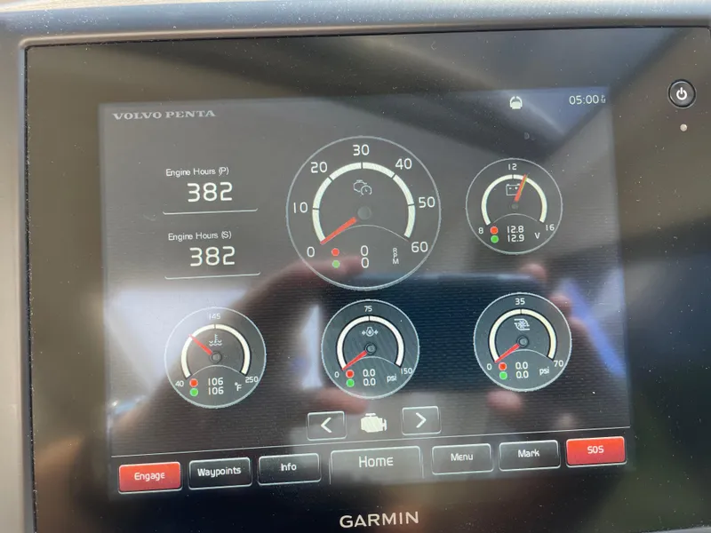 Slide: The Image of Dashboard display of a 2017 Riviera 3600 Sport Yacht showing engine hours and gauges. - 34