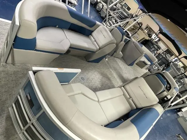 Slide: The Image of 2025 South Bay LE pontoon boat with canopy in showroom. - 3