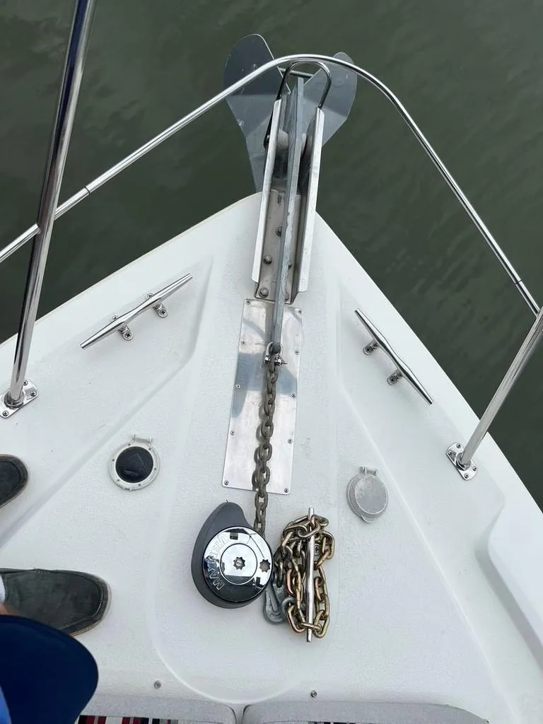 Slide: The Image of Bow of 1998 Carver 455 Aft Cabin Motoryacht with anchor and chain. - 30