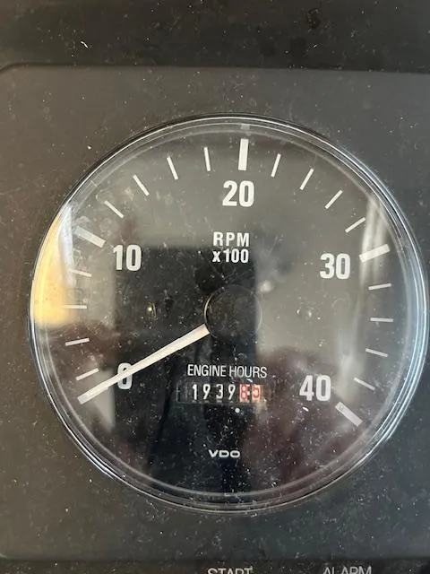 Slide: The Image of Tachometer of 2001 Nordic Tug 32 showing RPM and engine hours. - 16