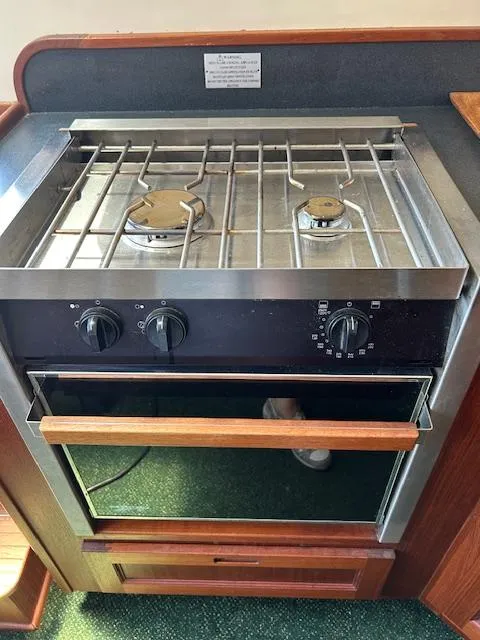 Slide: The Image of Stainless steel stove and oven in 2001 Nordic Tug 32 boat kitchen. - 20