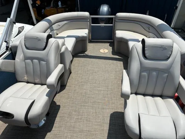 Slide: The Image of 2019 Bennington SSRX Pontoon 22 interior with plush seating and spacious layout. - 12