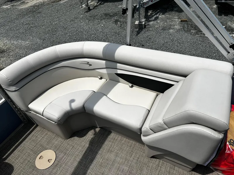 Slide: The Image of 2019 Bennington SSRX Pontoon 22 interior seating with light gray upholstery. - 17