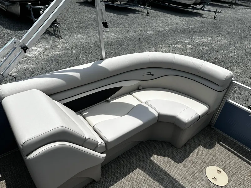 Slide: The Image of 2019 Bennington SSRX Pontoon 22 with plush seating and modern design. - 18