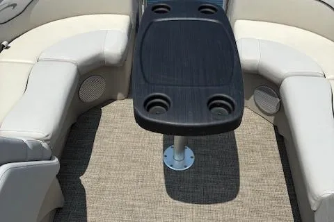 Slide: The Image of 2019 Bennington SSRX Pontoon 22 interior with seating and table. - 20