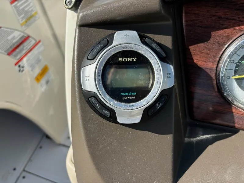 Slide: The Image of Sony marine stereo on 2010 Sea Ray 210 Select boat dashboard. - 7