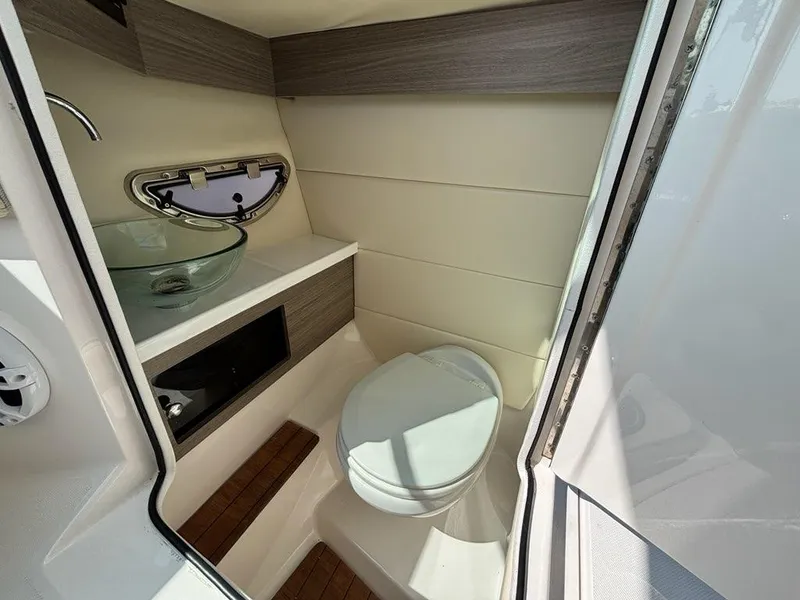 Slide: The Image of 2020 Regal 2800 Bowrider bathroom with modern sink and toilet. - 10