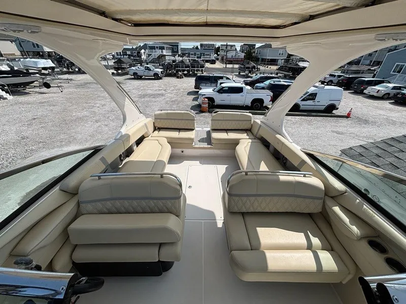 Slide: The Image of Luxurious interior of a 2020 Regal 2800 Bowrider boat with beige seating. - 13