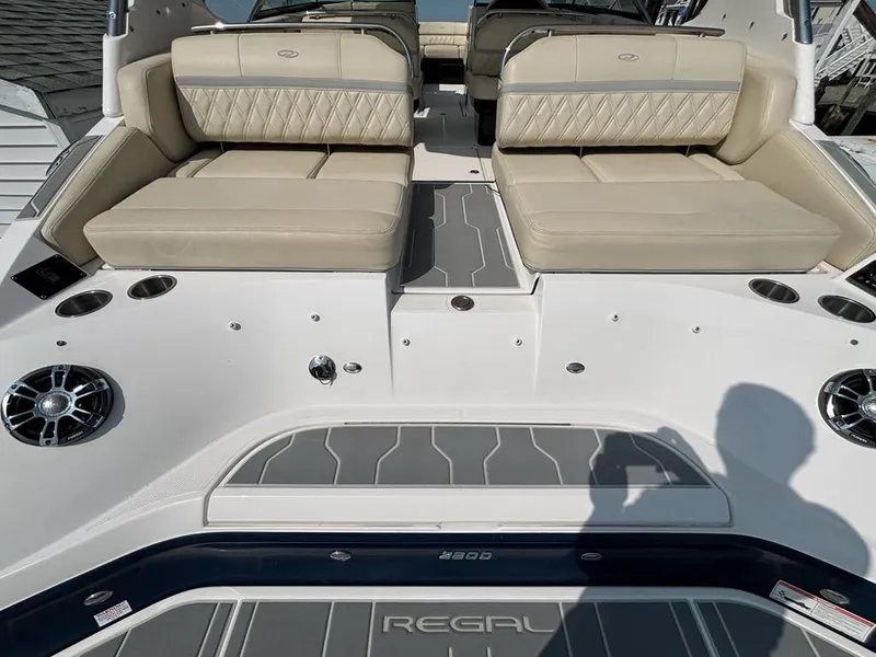 Slide: The Image of 2020 Regal 2800 Bowrider boat interior with beige seating and modern design. - 17