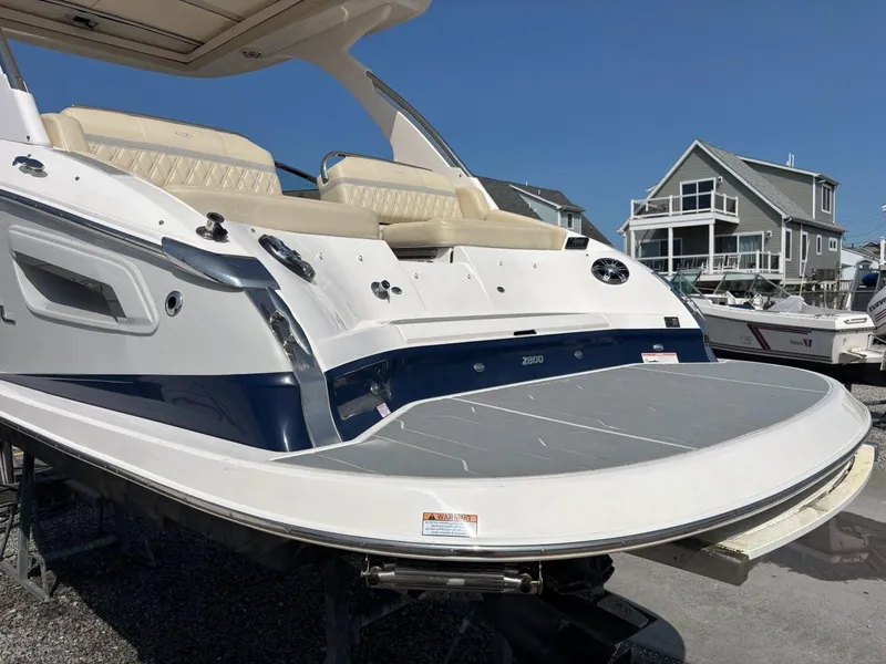 Slide: The Image of 2020 Regal 2800 Bowrider boat with spacious seating and sleek design. - 18