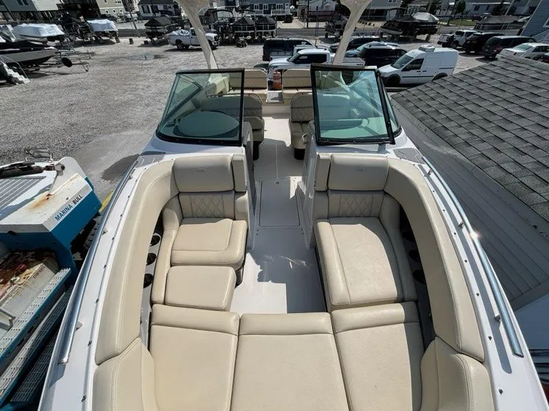 Slide: The Image of 2020 Regal 2800 Bowrider boat with spacious seating and open deck layout. - 4