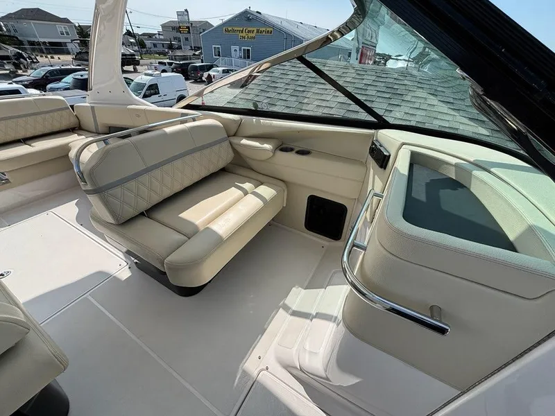 Slide: The Image of 2020 Regal 2800 Bowrider interior with beige seating and modern design. - 9