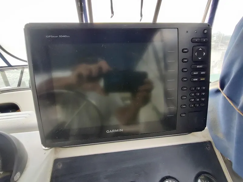 Slide: The Image of Garmin GPSMAP 1040xs on 1992 Carver 36 Aft Cabin boat dashboard. - 25