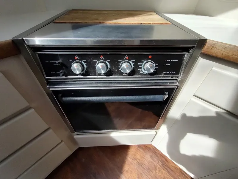 Slide: The Image of Stainless steel oven in 1992 Carver 36 Aft Cabin yacht kitchen. - 43
