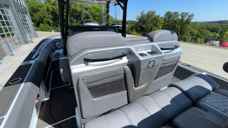 Slide: The Image of 2025 Fountain 34 SC boat interior with sleek seating and modern design. - 15