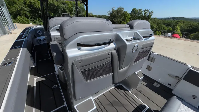 Slide: The Image of 2025 Fountain 34 SC boat interior with sleek seating and modern design. - 17