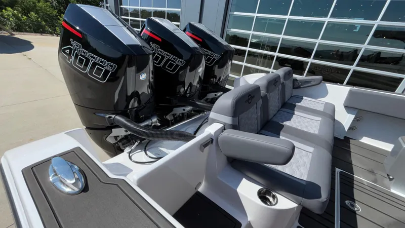 Slide: The Image of 2025 Fountain 34 SC boat with triple Racing 400 engines and luxurious seating. - 20