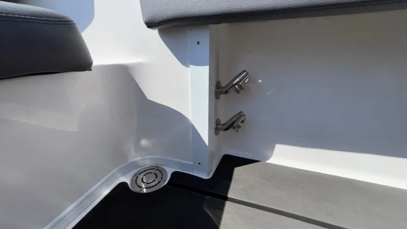 Slide: The Image of Interior detail of 2025 Fountain 34 SC boat, featuring sleek fixtures and seating. - 23