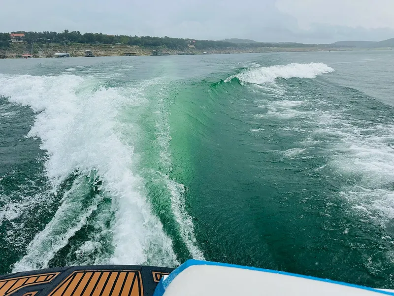 Slide: The Image of Wake created by 2015 Nautique Super Air Nautique G23 on a lake. - 24