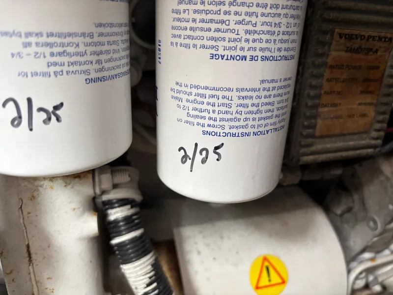 Slide: The Image of Close-up of engine filters in a 2004 Riviera 4000 boat. - 37